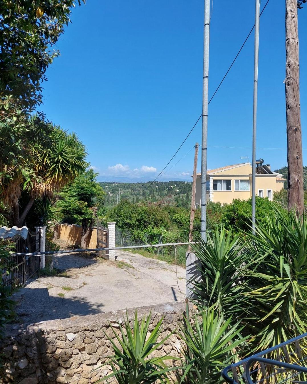 Thanos Guesthouse Corfu Áyioi Dhéka Exterior foto